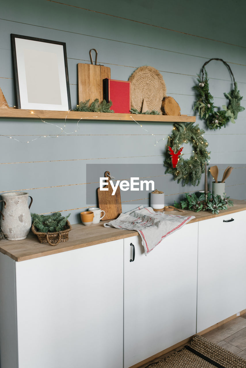 Christmas kitchen decor. details of scandinavian cuisine in white and mint color.