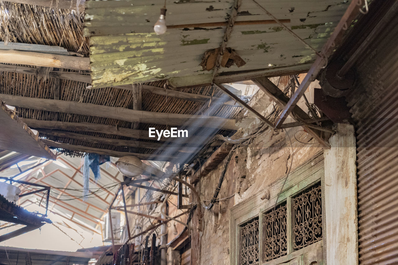 Low angle view of ceiling in abandoned building