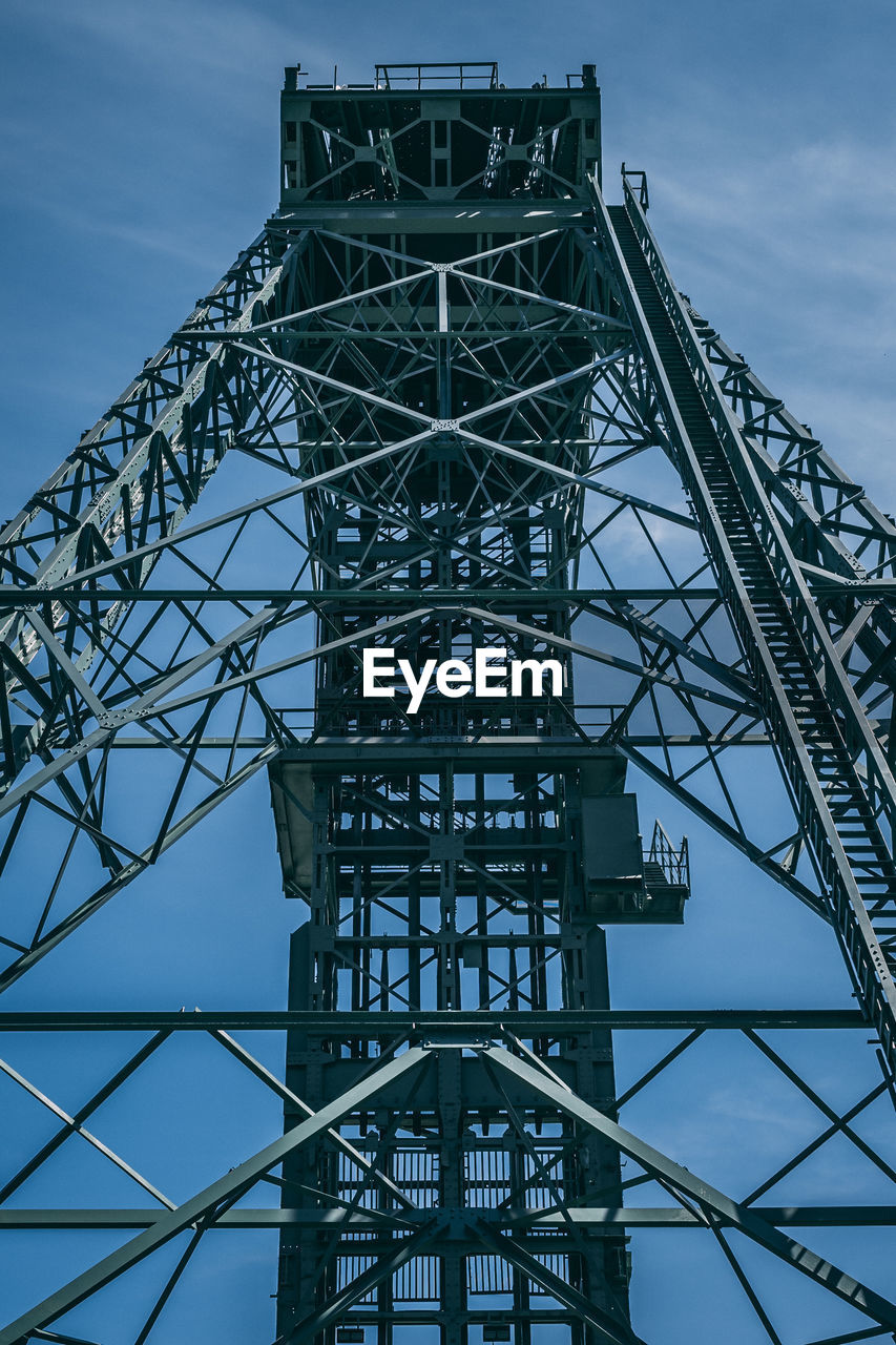 LOW ANGLE VIEW OF COMMUNICATIONS TOWER BRIDGE