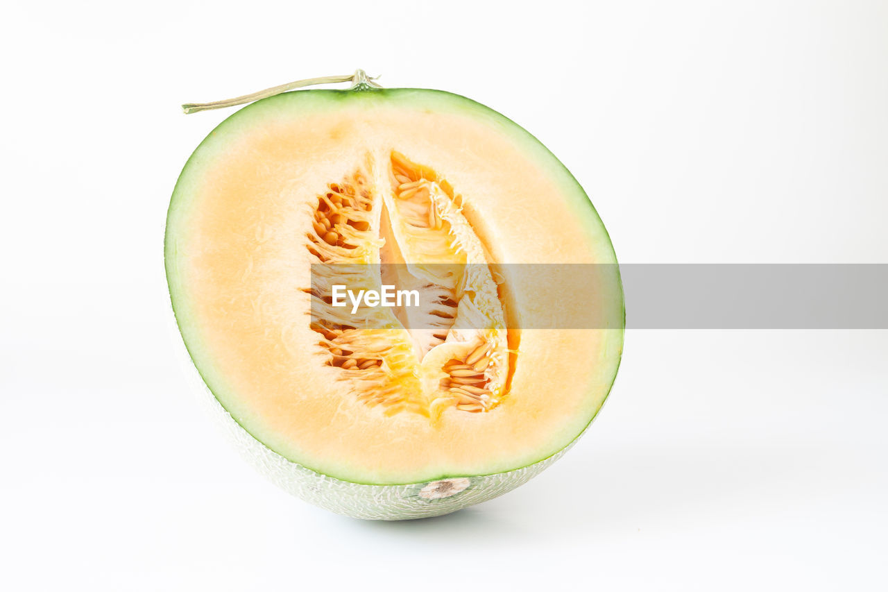 Close-up of cantaloupe against white background