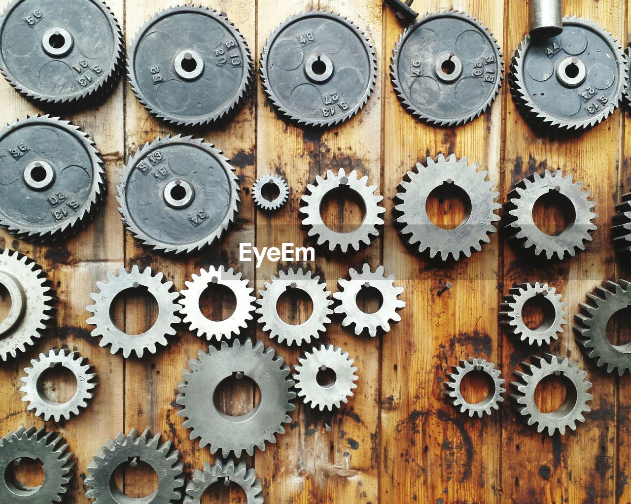 Directly above view of metallic gears on table