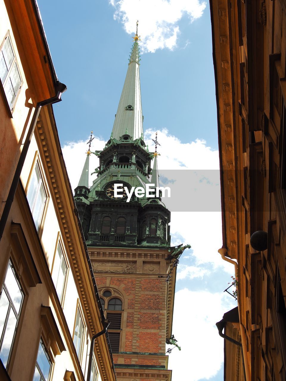 Low angle view of building and clock tower