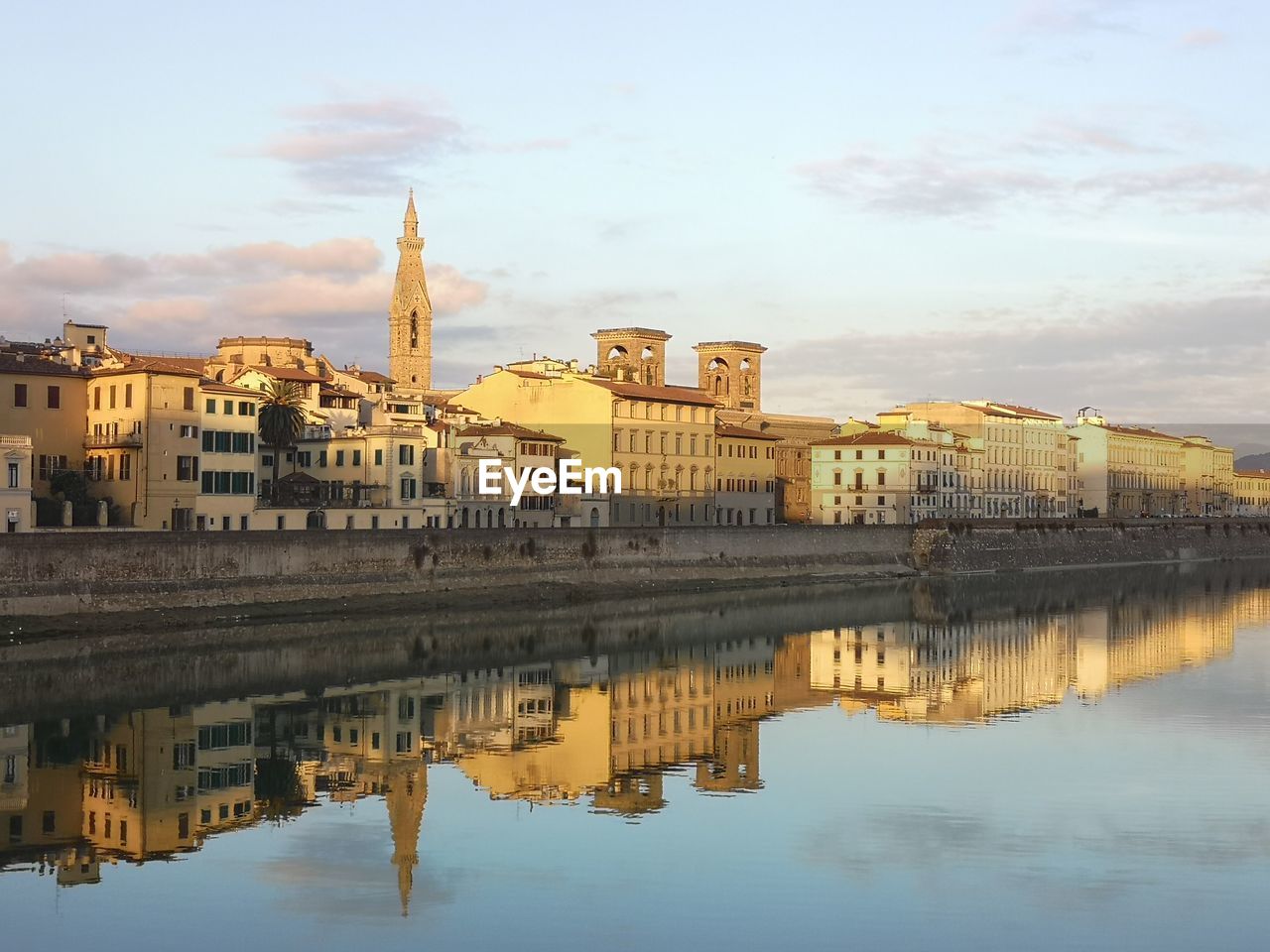 REFLECTION OF BUILDING IN RIVER