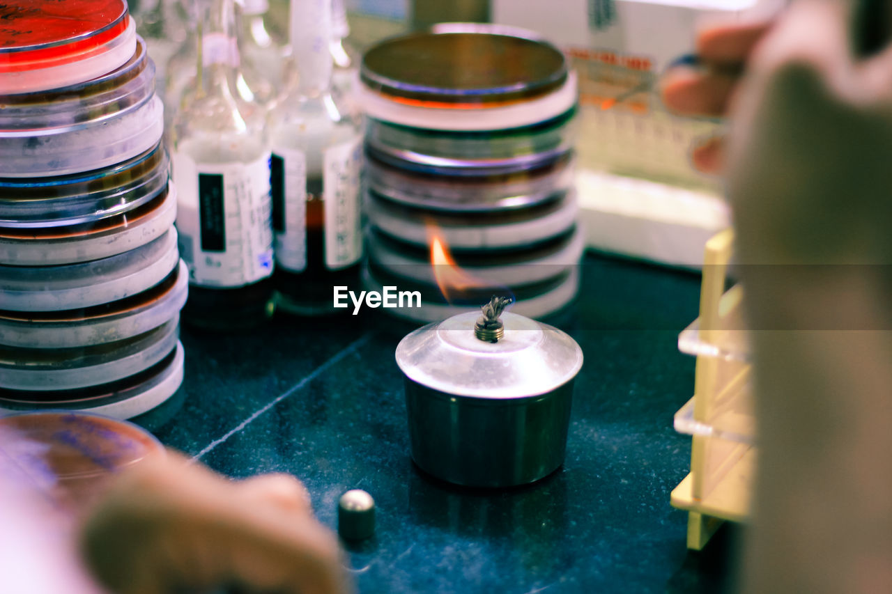 Close-up of person hands experimenting in laboratory