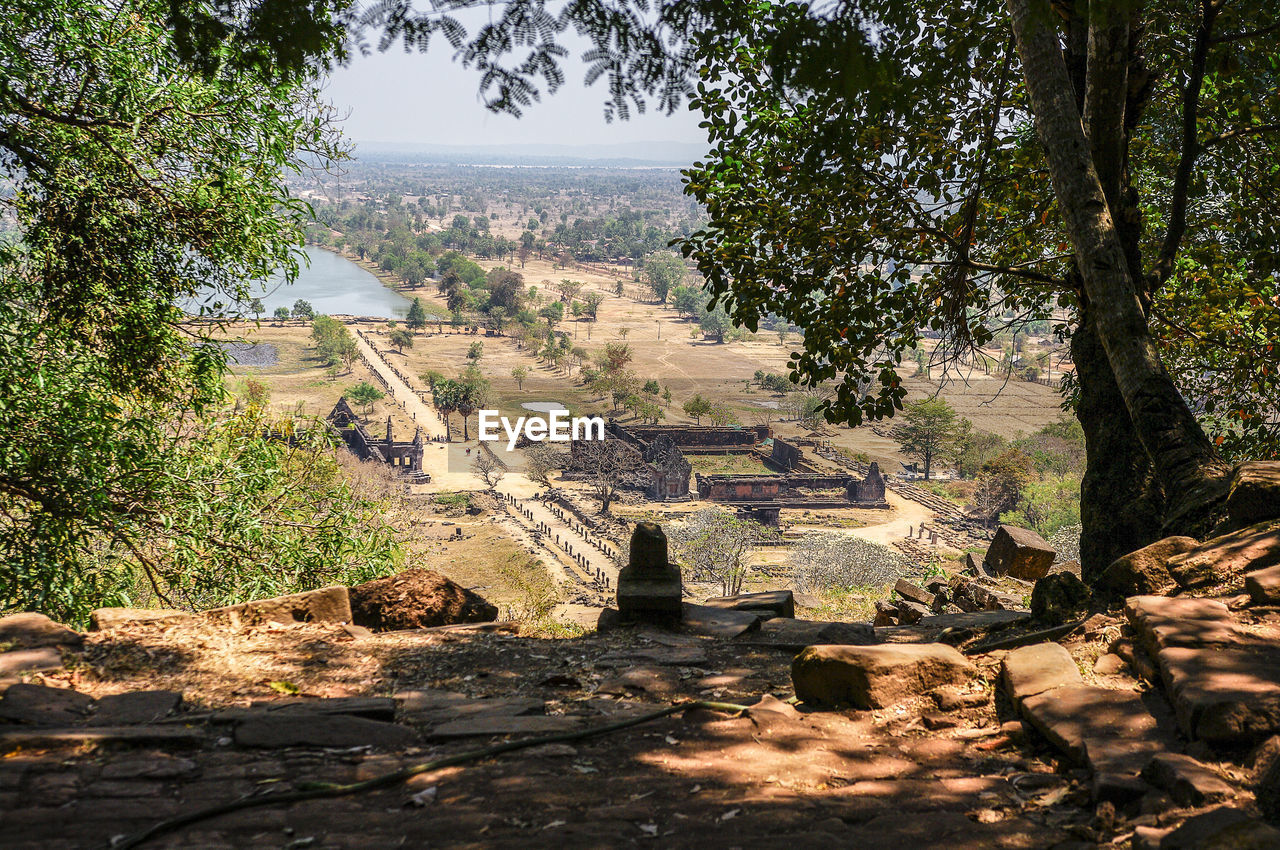 Scenic view of sea with trees in background wat phou temple laos