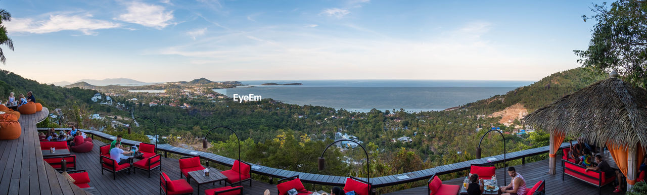 HIGH ANGLE VIEW OF SEA AND MOUNTAIN AGAINST SKY