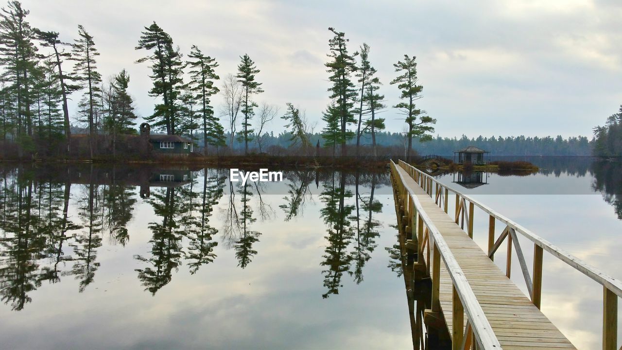 Wooden footbridge leading to hut 