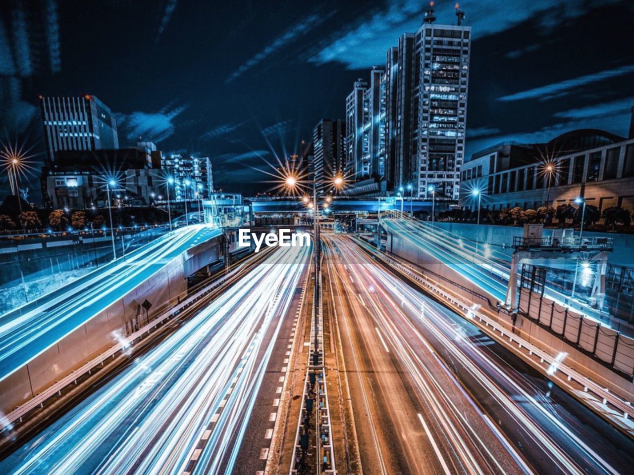 Light trails on city street at night