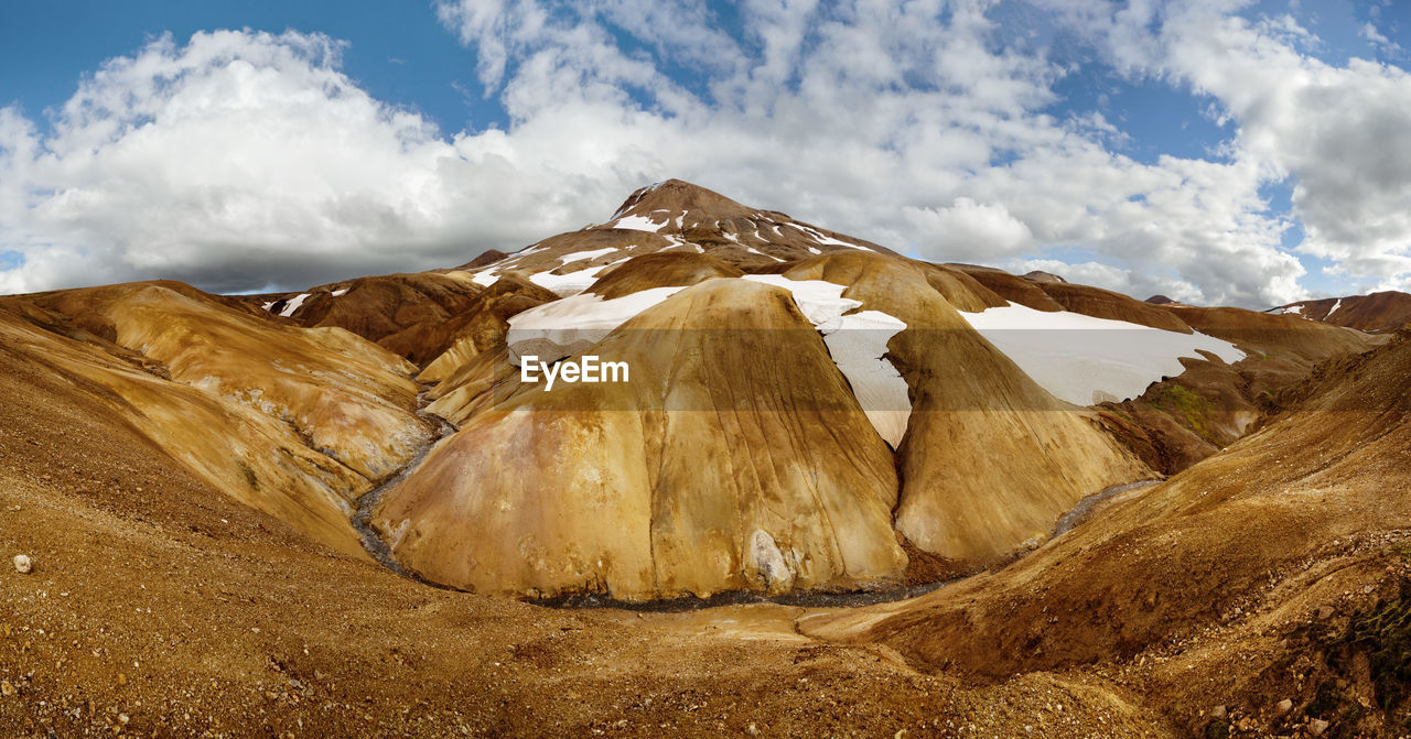 Panoramic view of mountains against sky