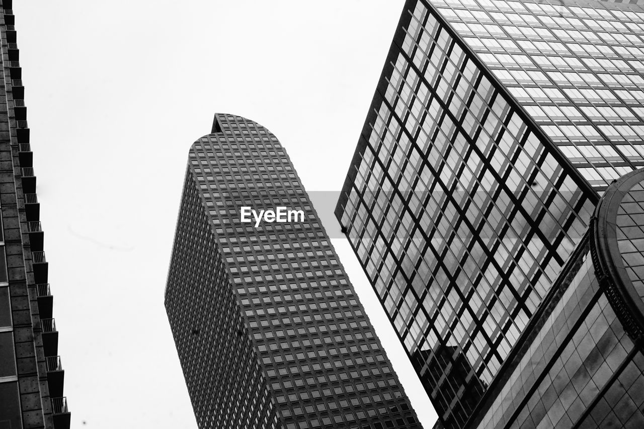 Low angle view of modern buildings against clear sky