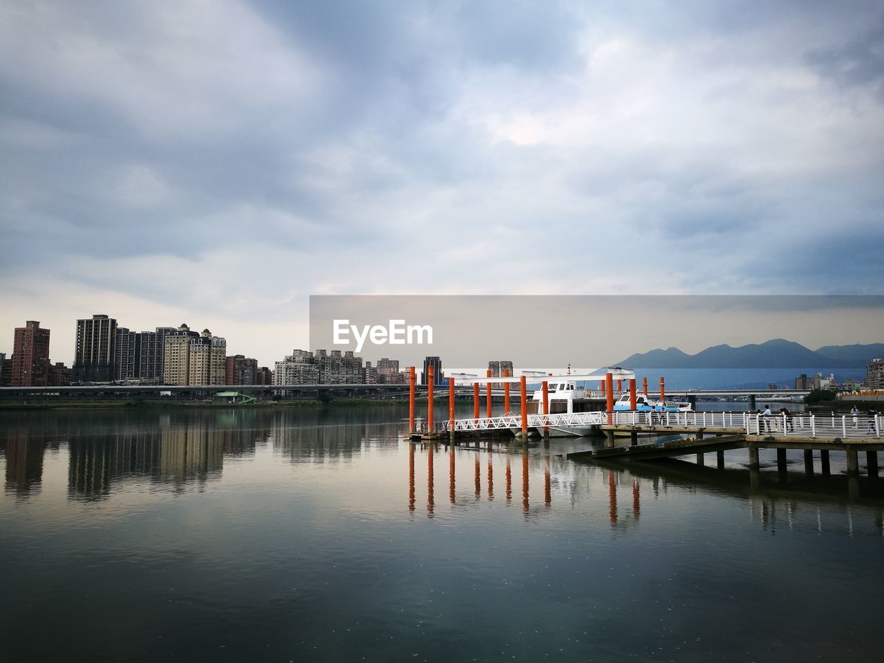 View of buildings against cloudy sky