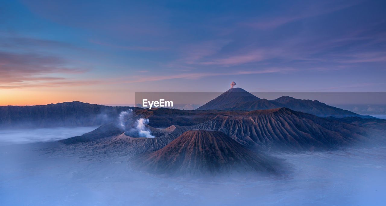 View of volcanic landscape during sunrise