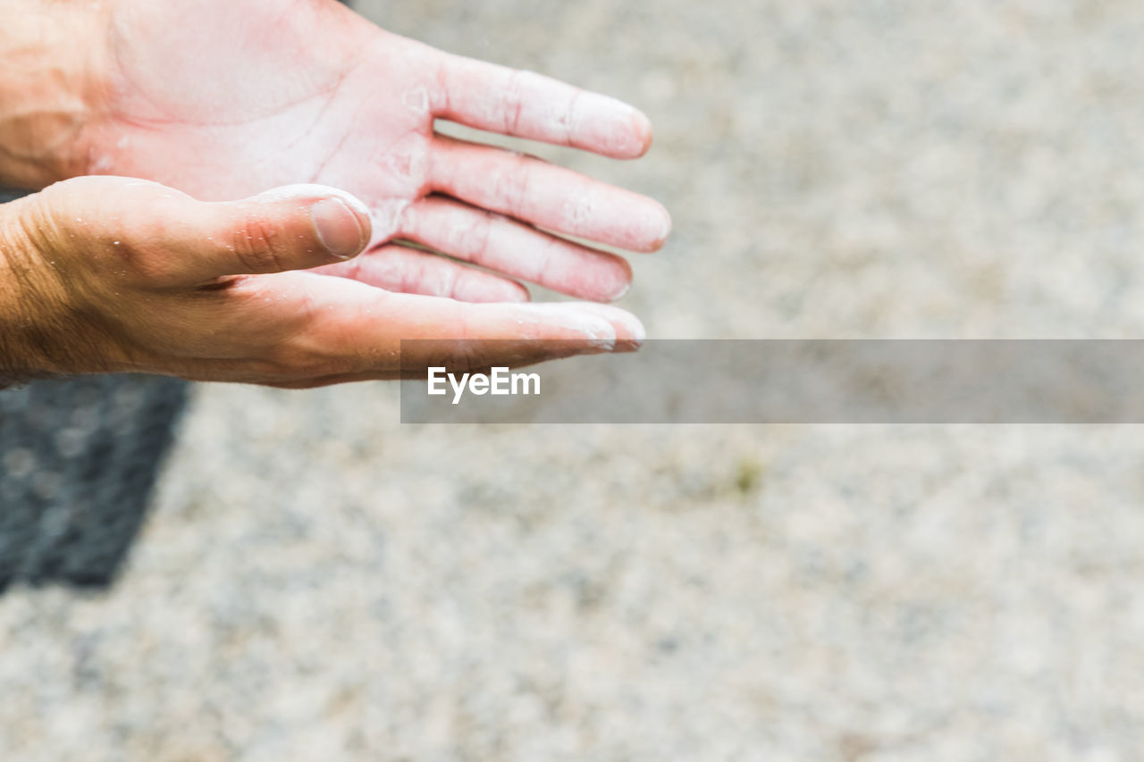Cropped hands of person begging