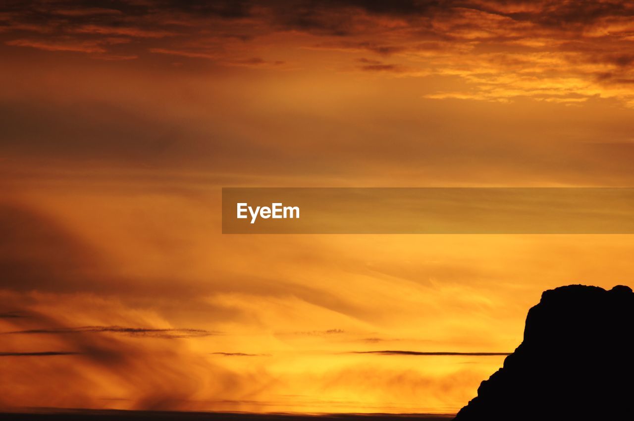 LOW ANGLE VIEW OF DRAMATIC SKY