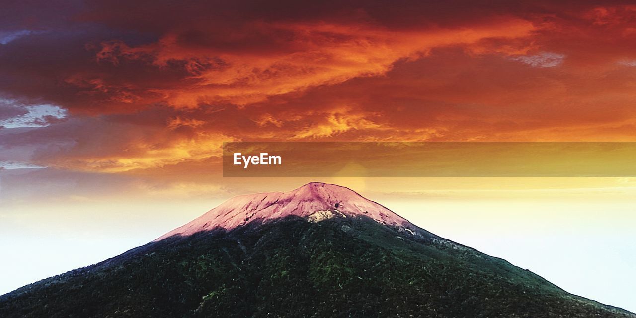 SCENIC VIEW OF VOLCANIC MOUNTAIN DURING SUNSET