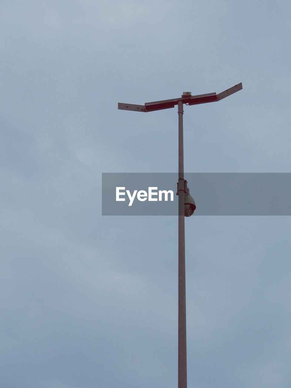 LOW ANGLE VIEW OF POLE AGAINST SKY