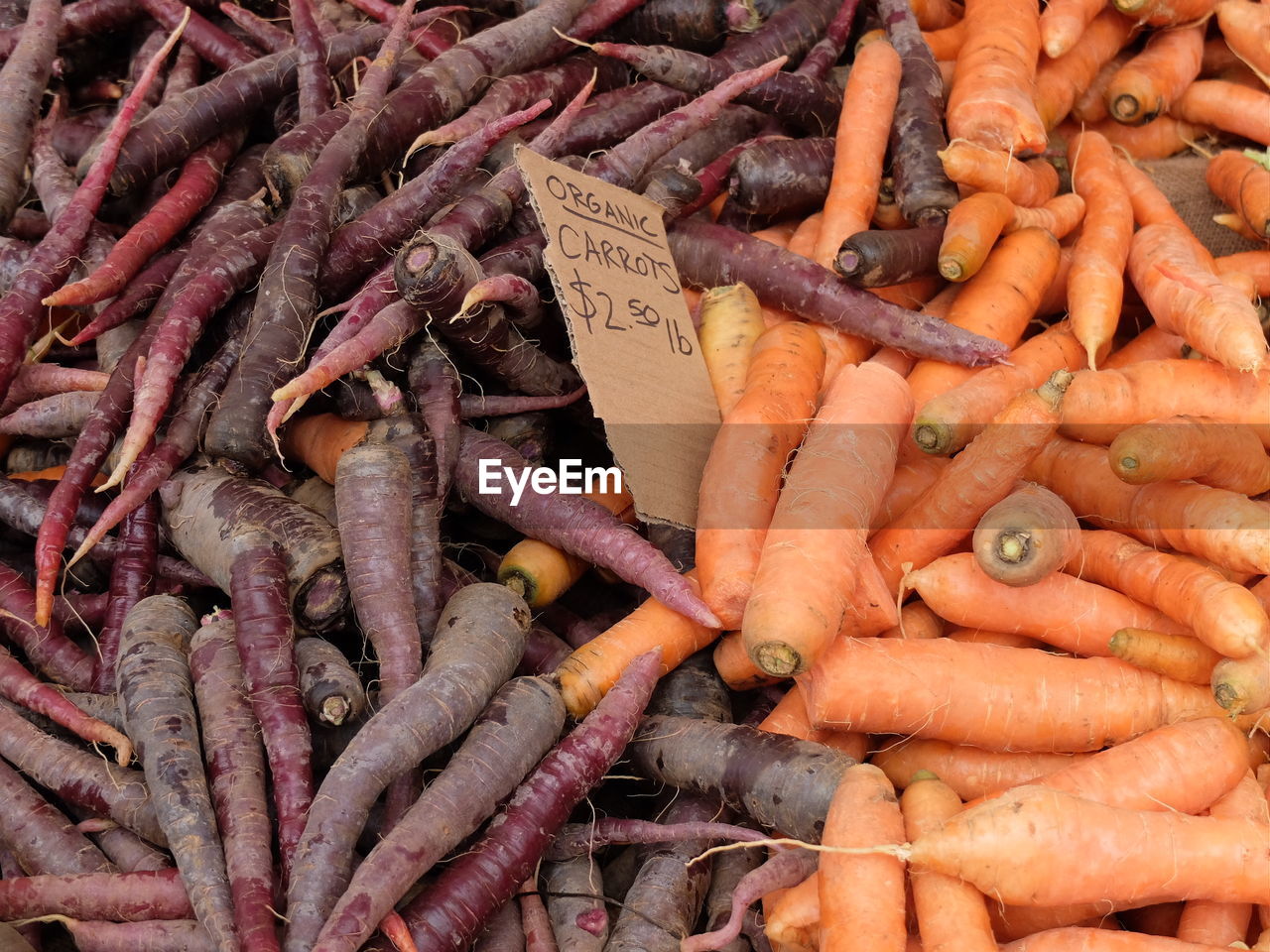 High angle view of carrot for sale at market stall