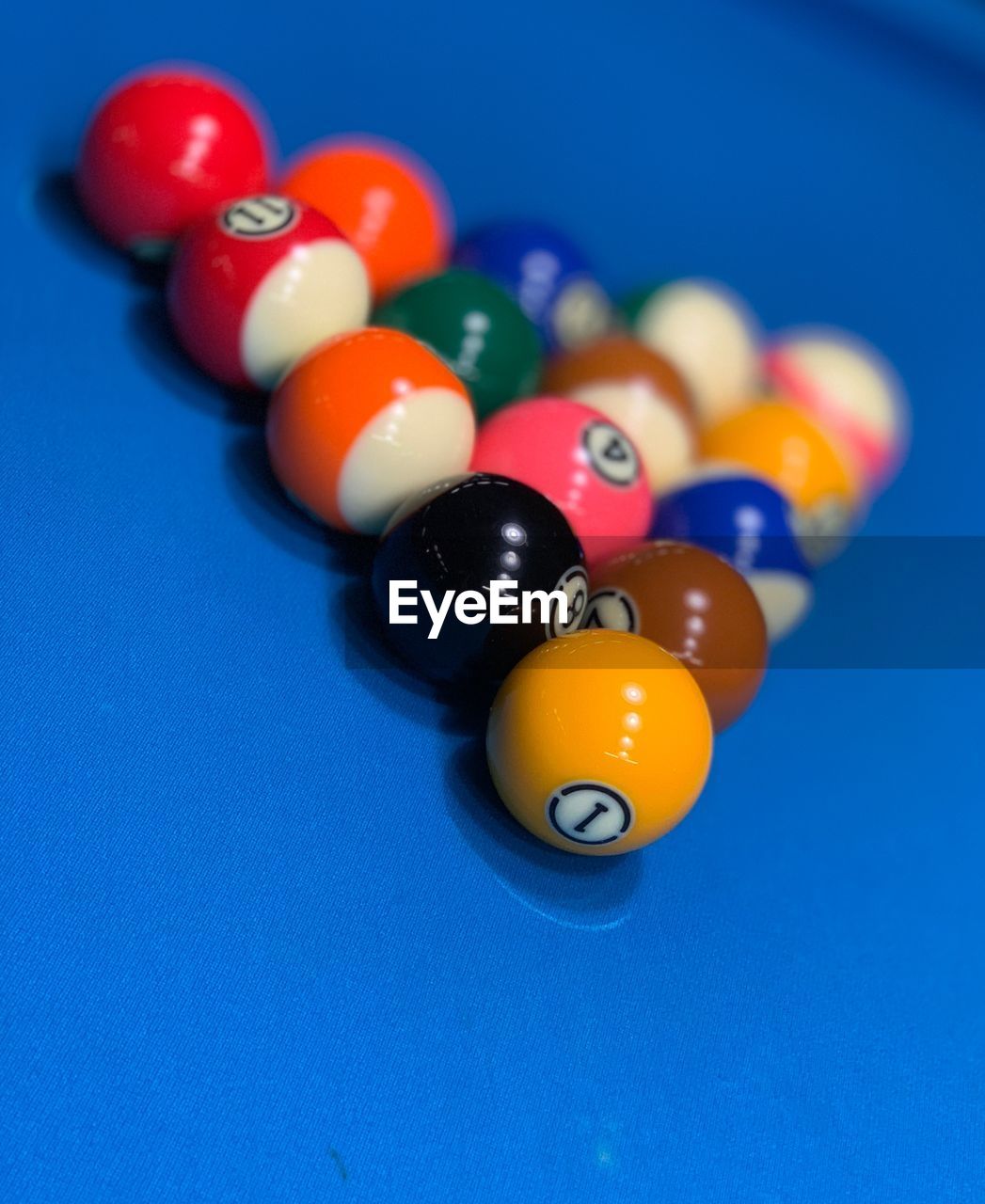 High angle view of multi colored snooker balls on table