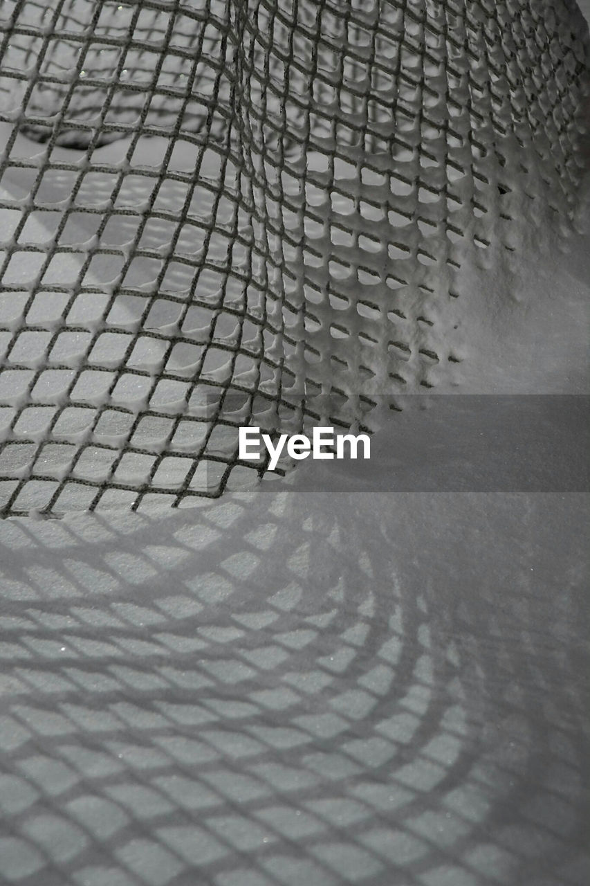 CLOSE-UP OF SAND AT BEACH