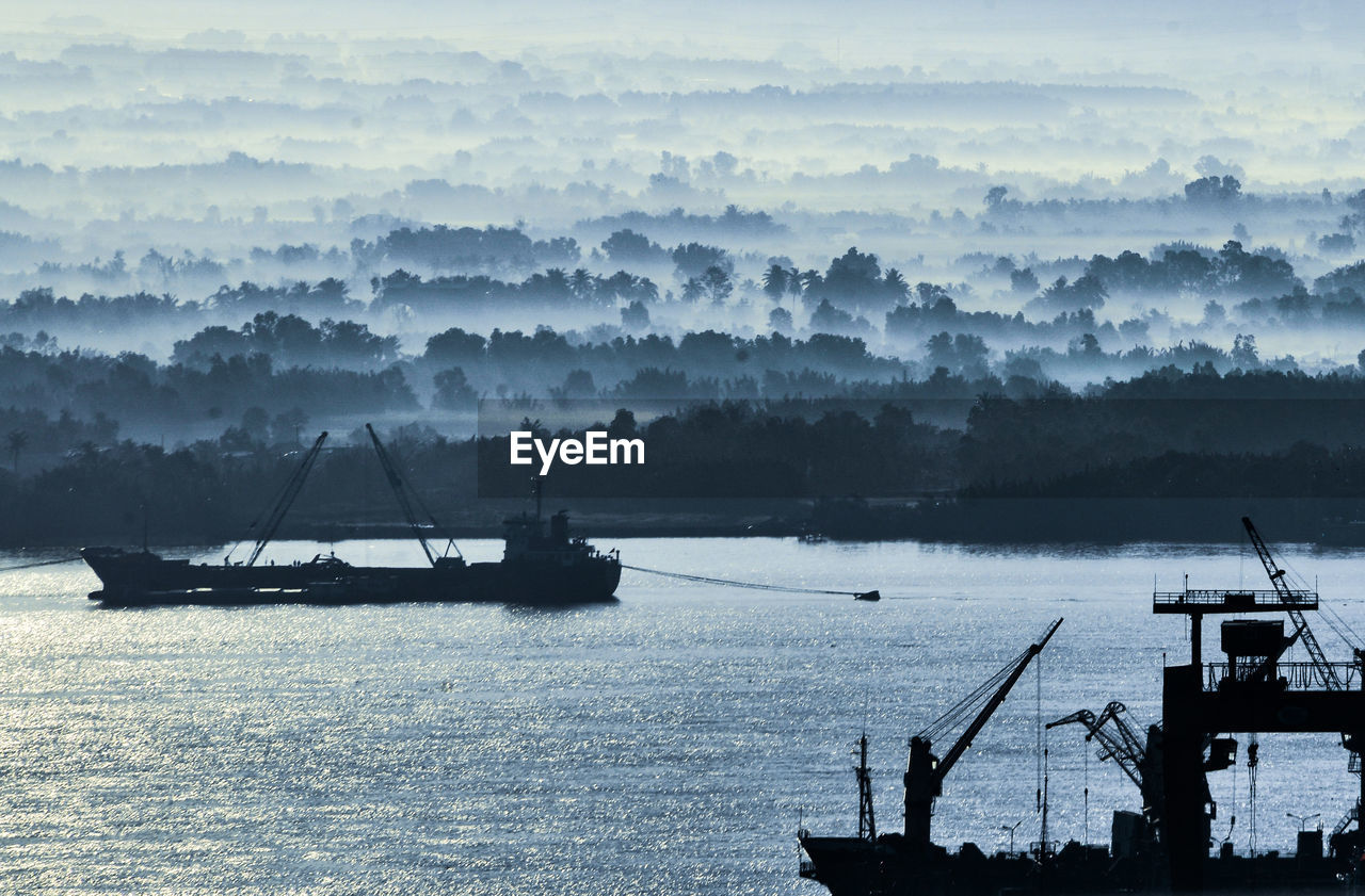 Ground fog at saigon river bank, vietnam