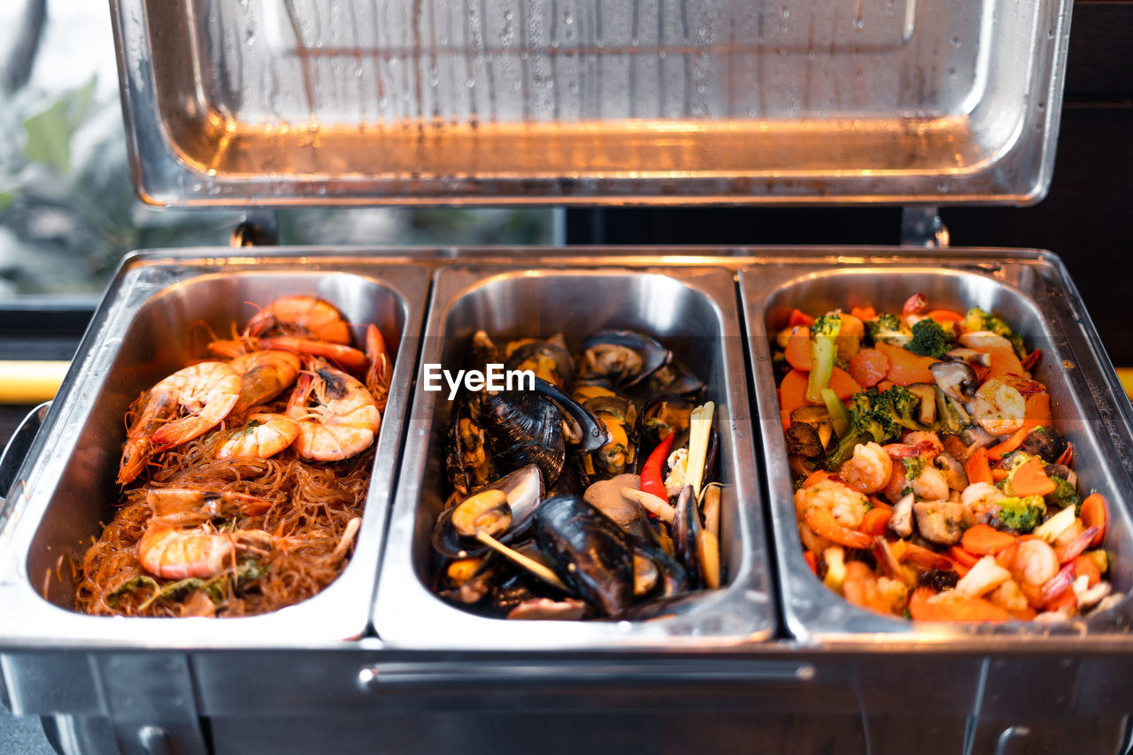 High angle view of food on barbecue grill