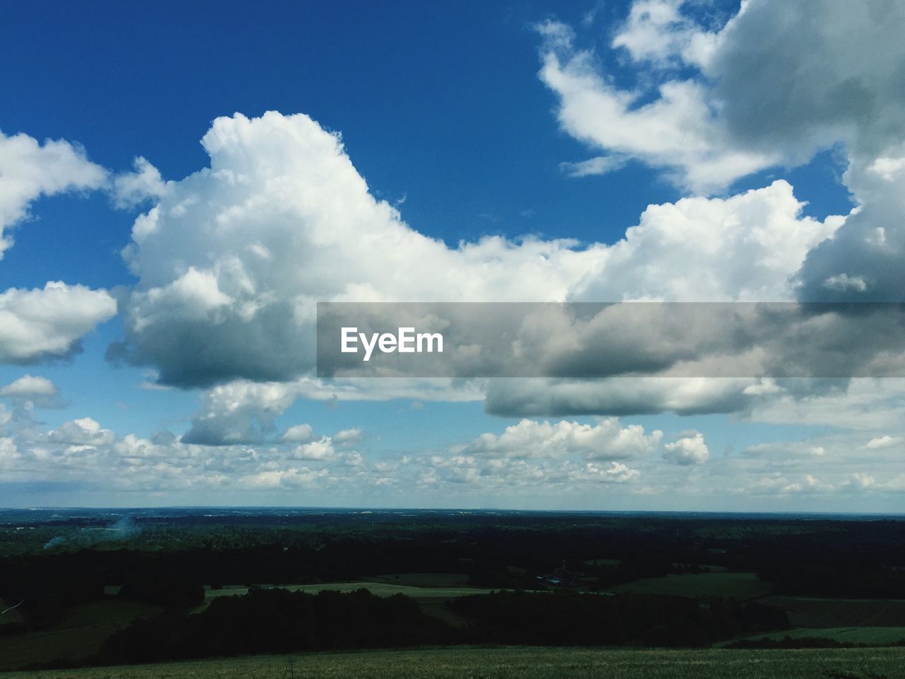 VIEW OF LANDSCAPE AGAINST CLOUDY SKY