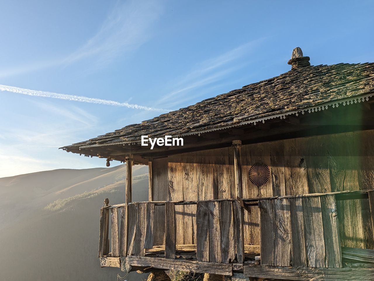 architecture, built structure, sky, water, nature, building, building exterior, no people, house, wood, landscape, hut, sea, day, land, travel destinations, environment, travel, stilt house, outdoors, rural scene, tourism, roof, scenics - nature, history