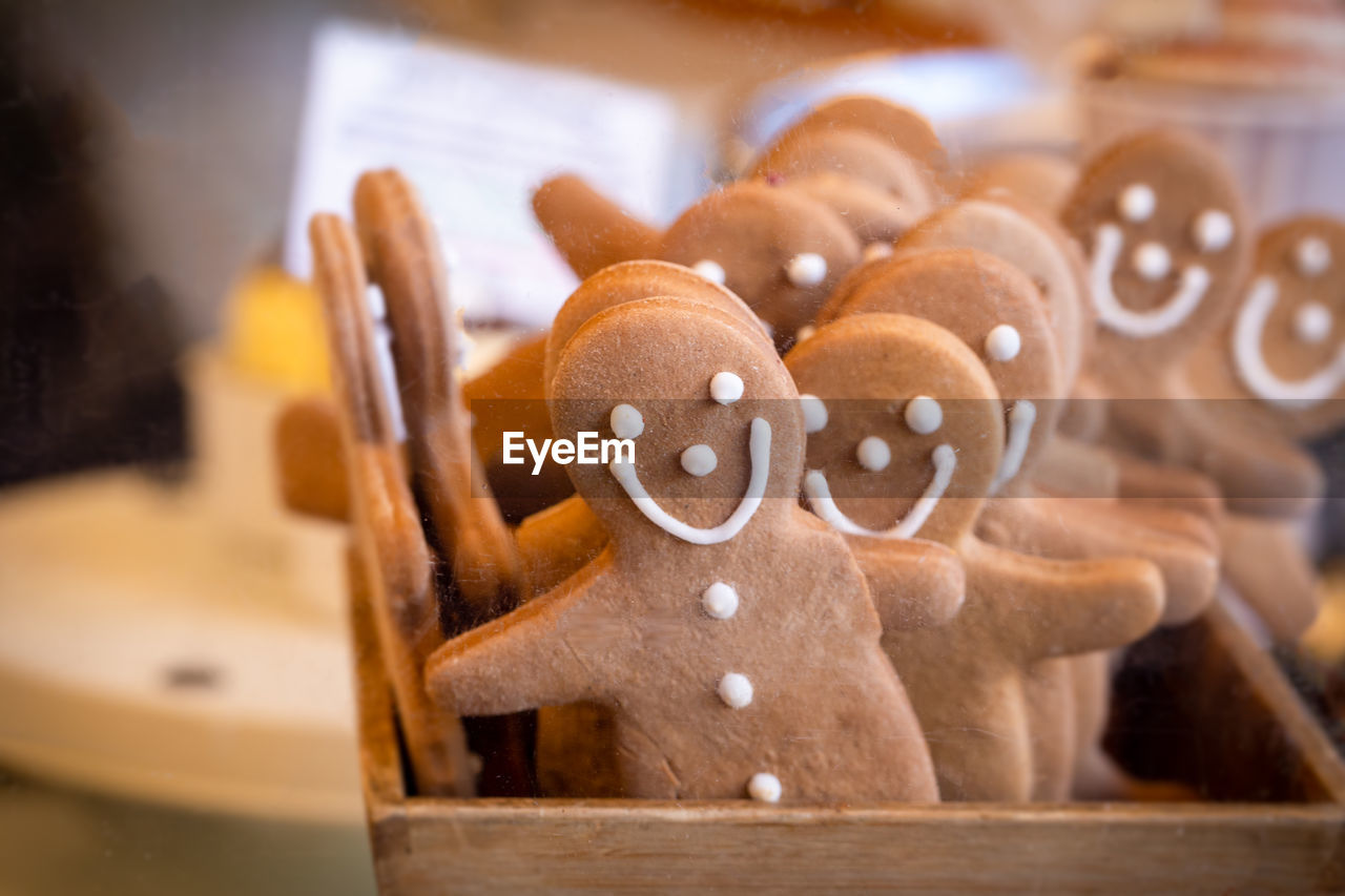 Close-up of gingerbread men cookies on a market stall