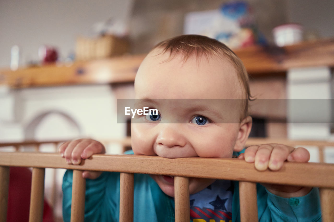 Portrait of cute baby at home