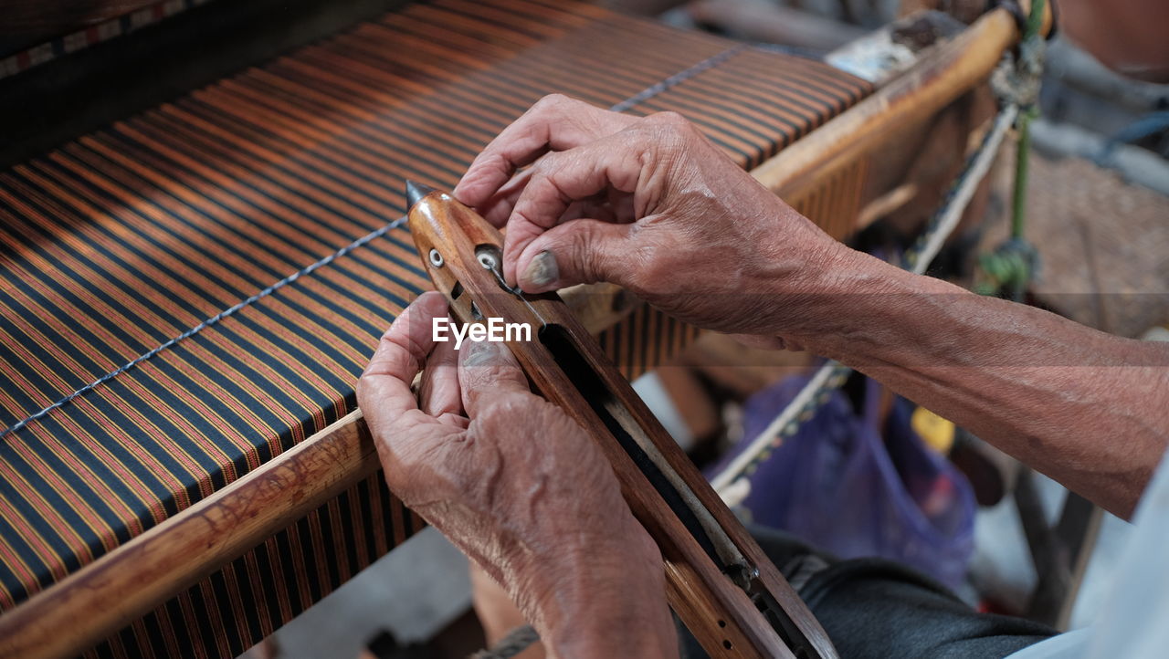 Cropped image of man working