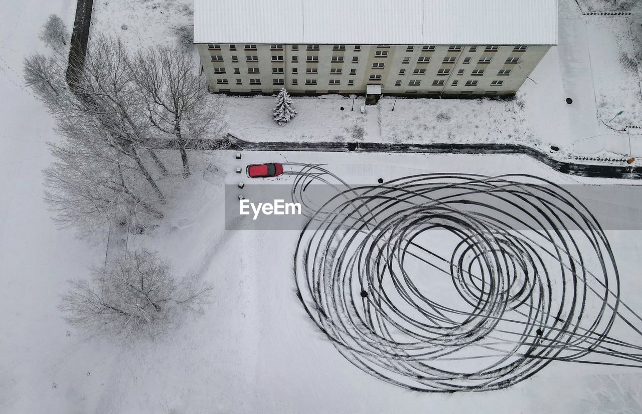 HIGH ANGLE VIEW OF SNOW ON BICYCLE DURING WINTER