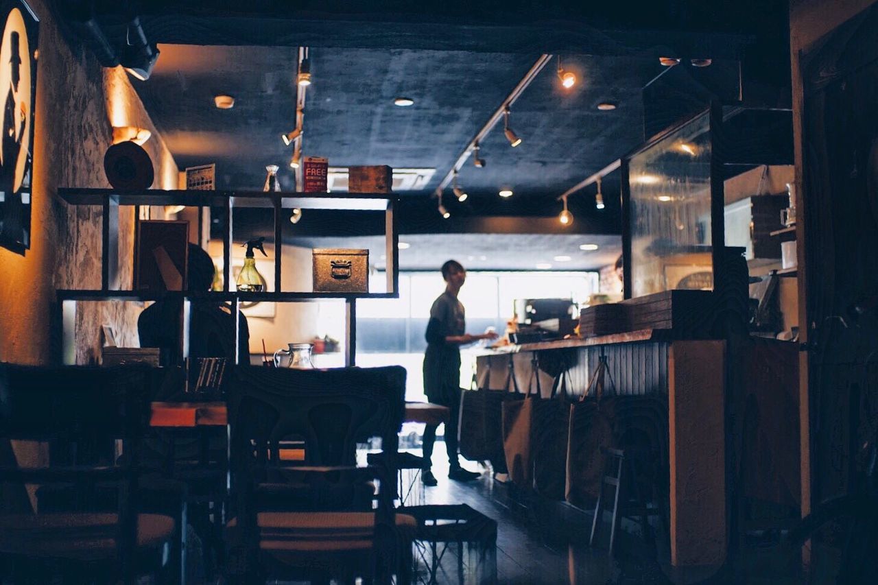 WOMAN WORKING ON RESTAURANT