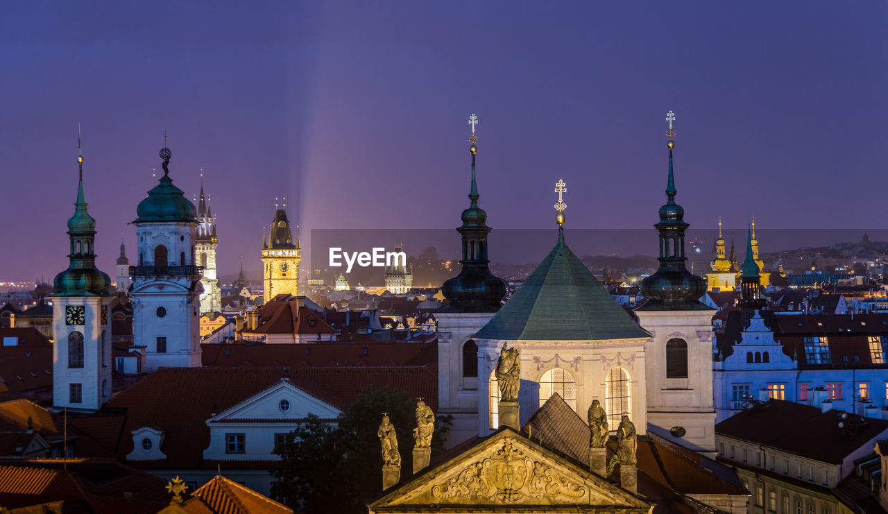 VIEW OF CITYSCAPE AT NIGHT