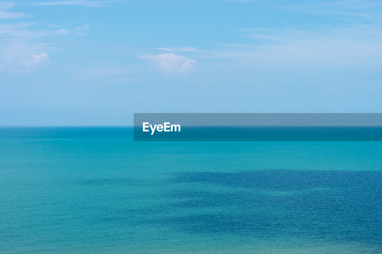 Scenic view of blue sea against sky