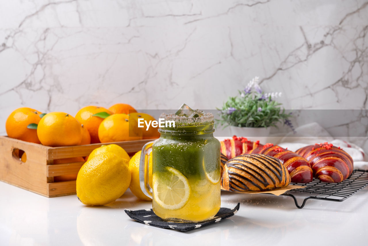 CLOSE-UP OF FRUITS IN BASKET WITH VEGETABLES