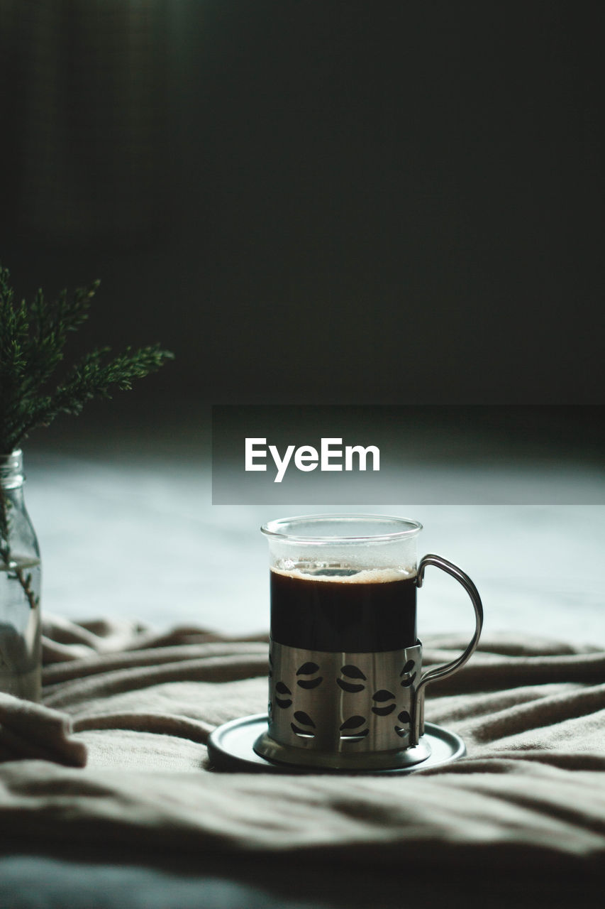 Close-up of coffee cup on table