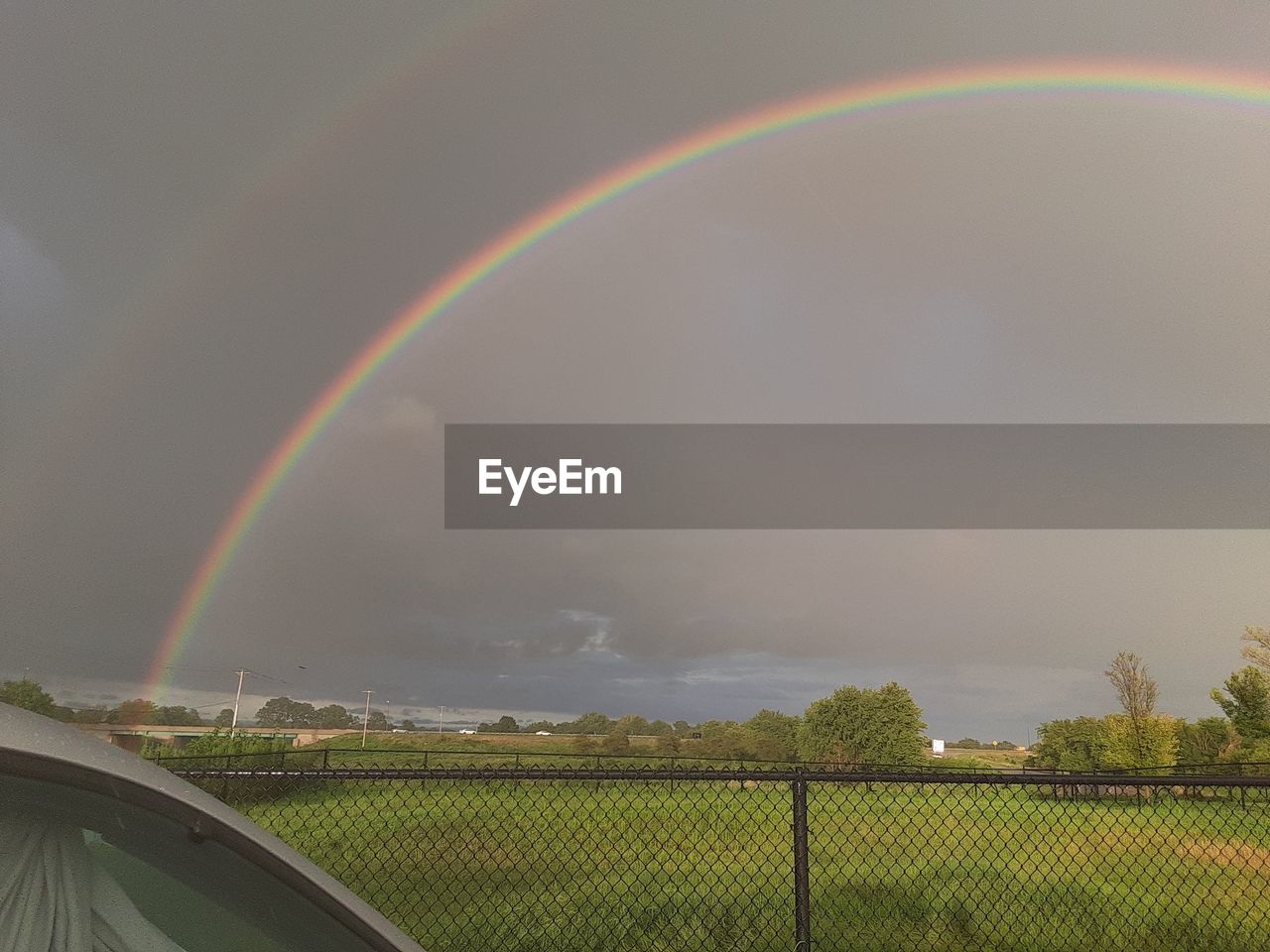 SCENIC VIEW OF RAINBOW AGAINST SKY