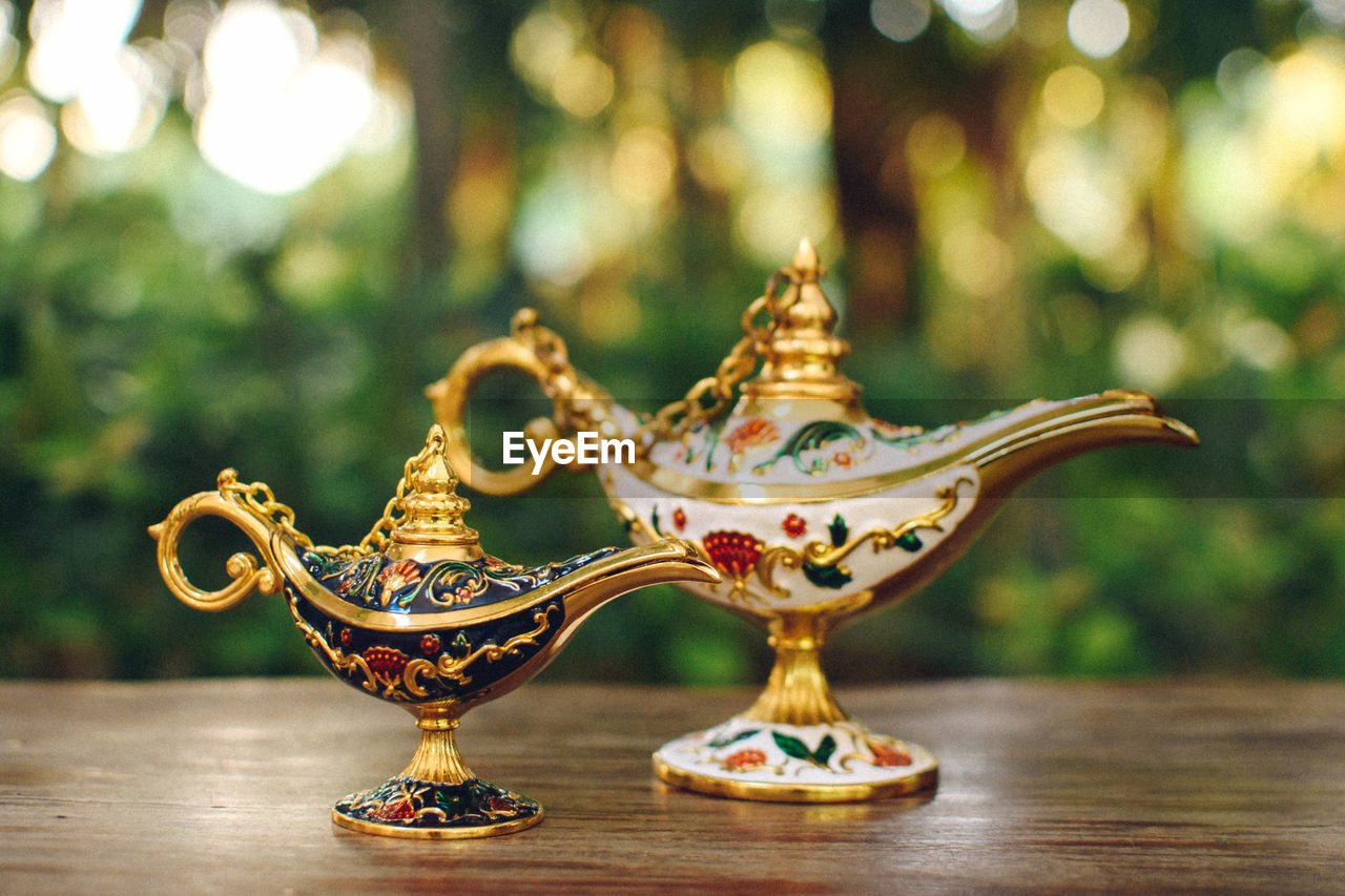 Product photo of a turkish teapot with a lot of decoration, handmade crafts