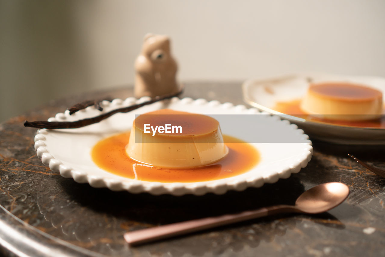 Close-up of custard in plate on table