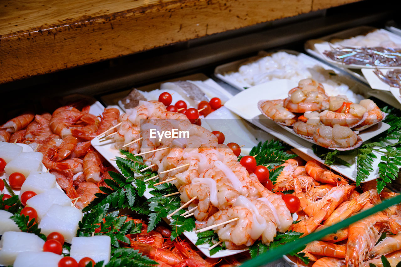 High angle view of food on plates at tapas bar