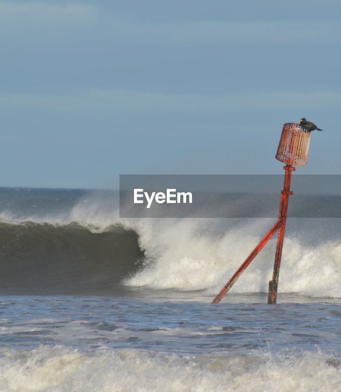 SCENIC VIEW OF SEA WAVES RUSHING TOWARDS SHORE