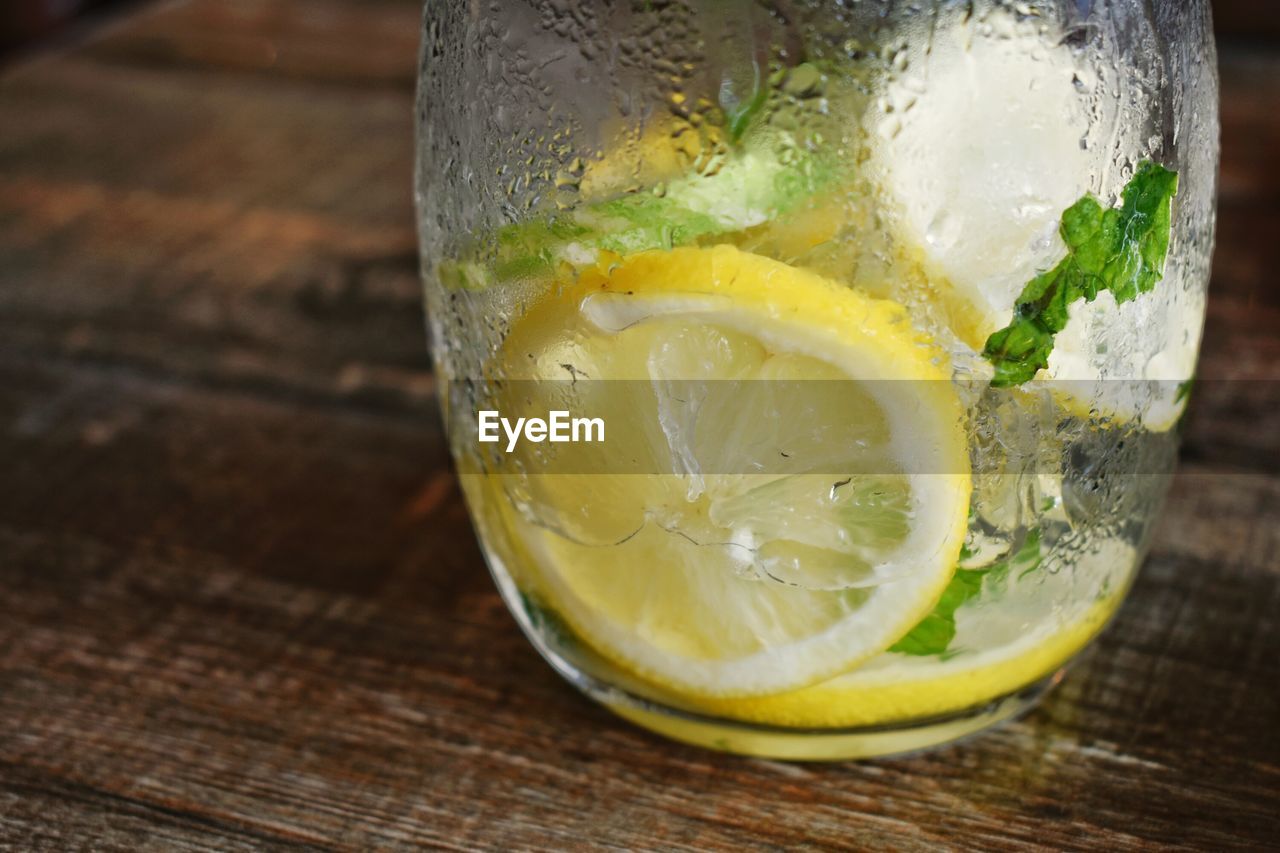 CLOSE-UP OF DRINK ON TABLE