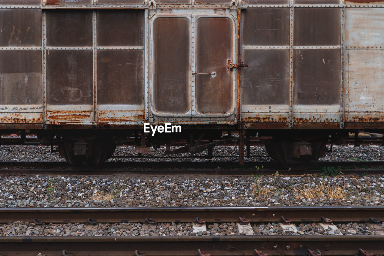 TRAIN ON RAILROAD PLATFORM