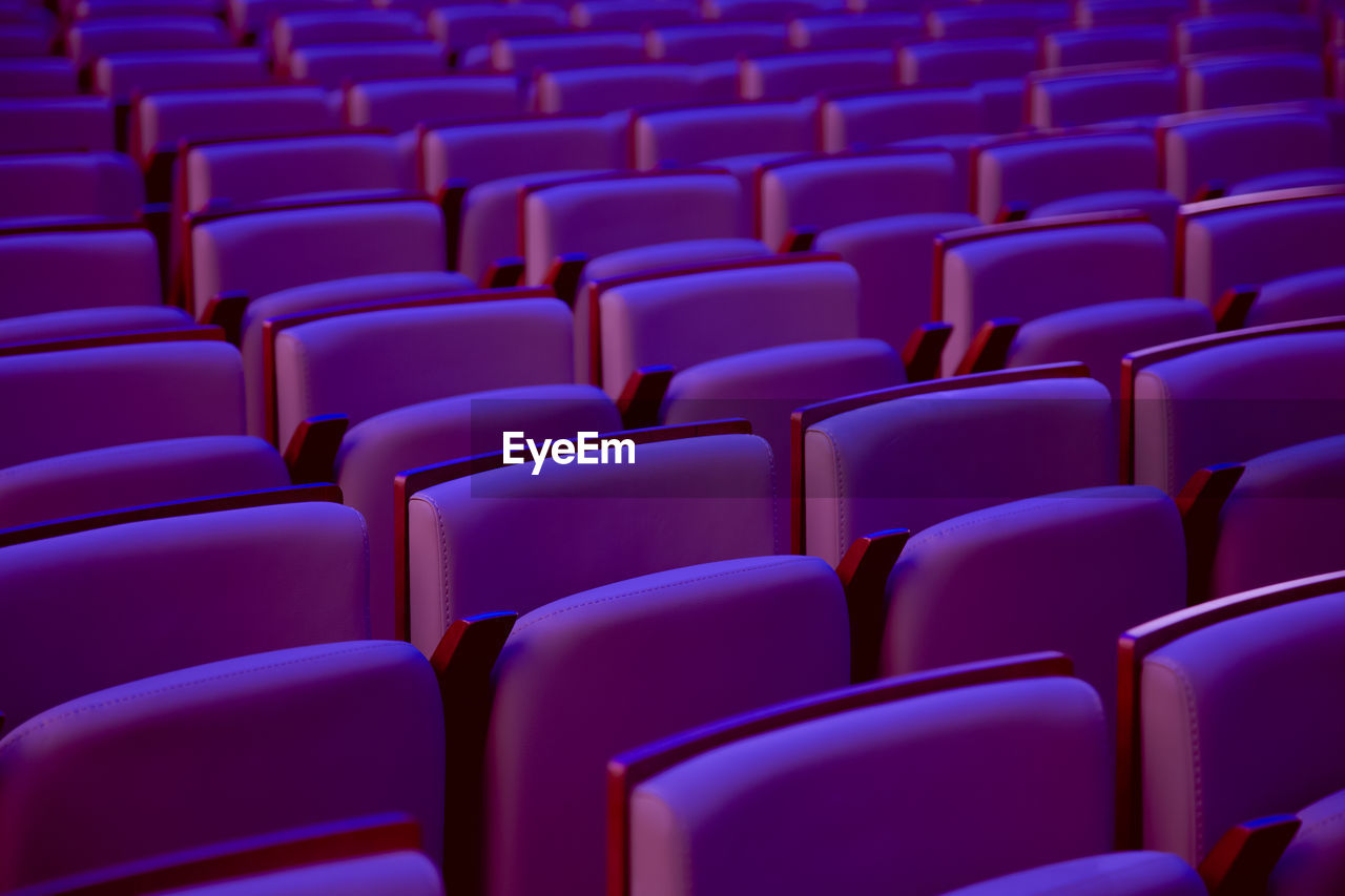 Full frame shot of empty chairs at movie theater