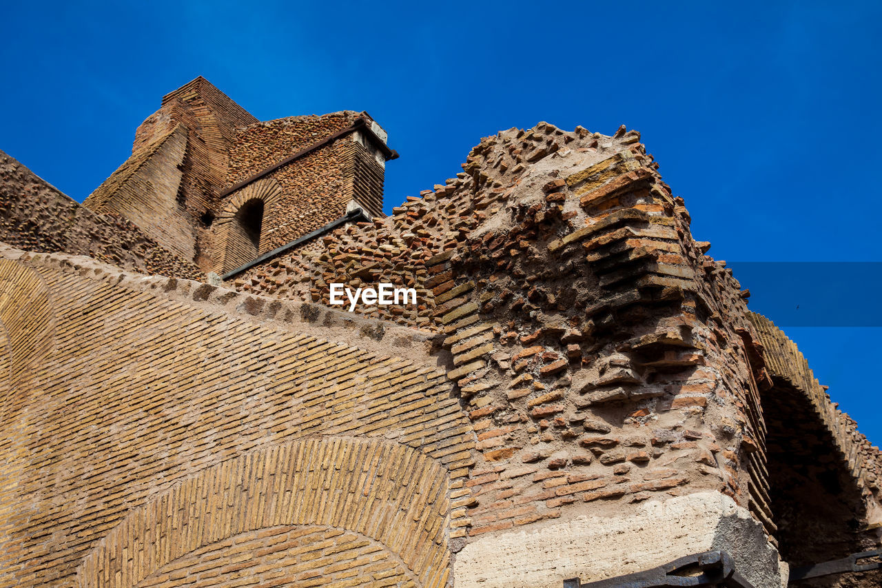 Detail of the walls of the famous colosseum in rome