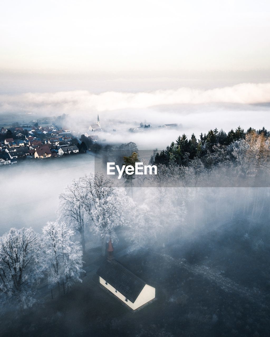 Aerial view of houses during winter