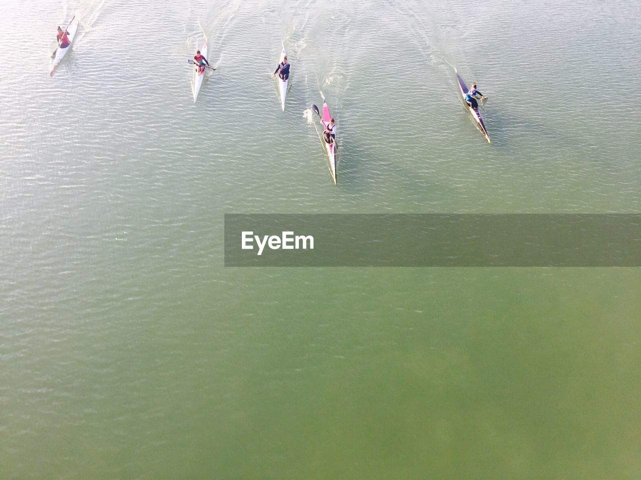 High angle view of people kayaking on river