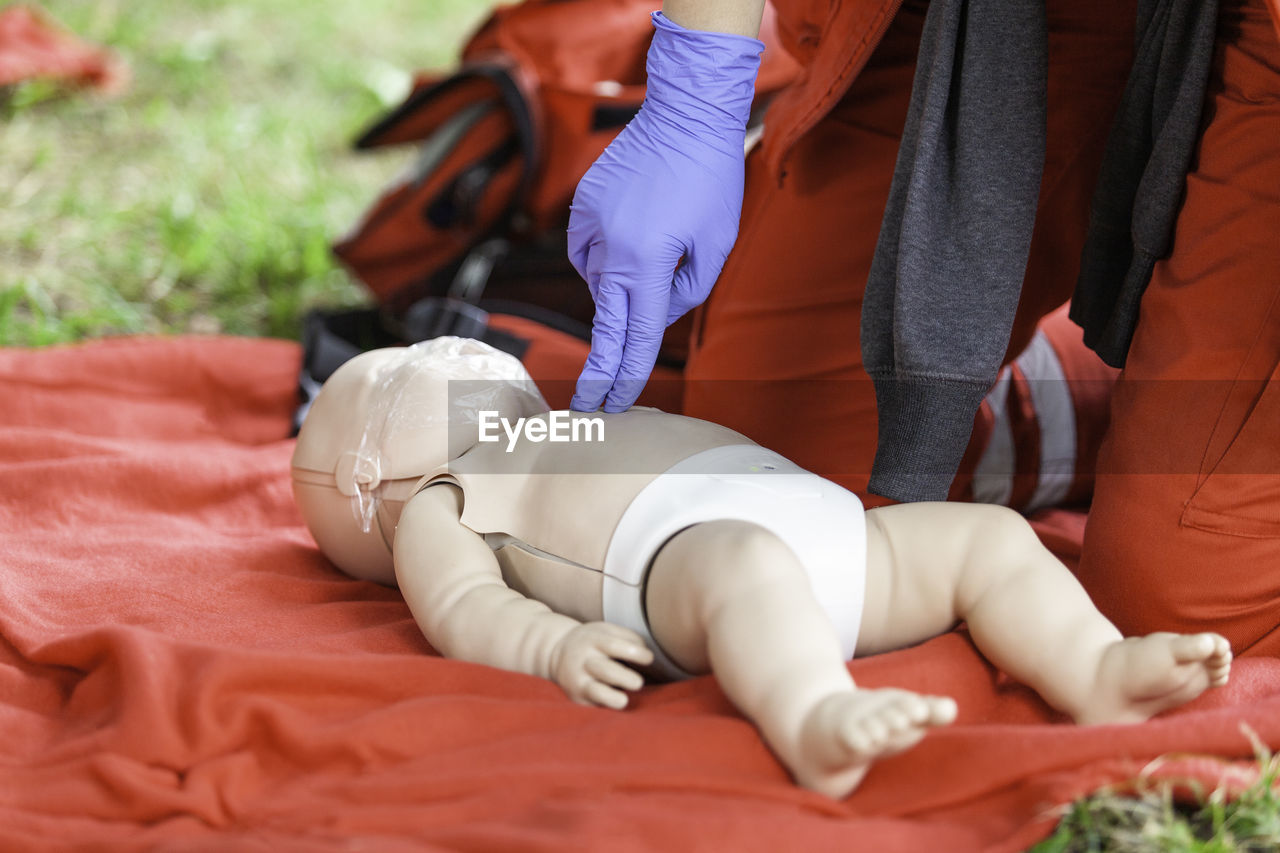 Baby or child cpr dummy first aid course. heart massage.