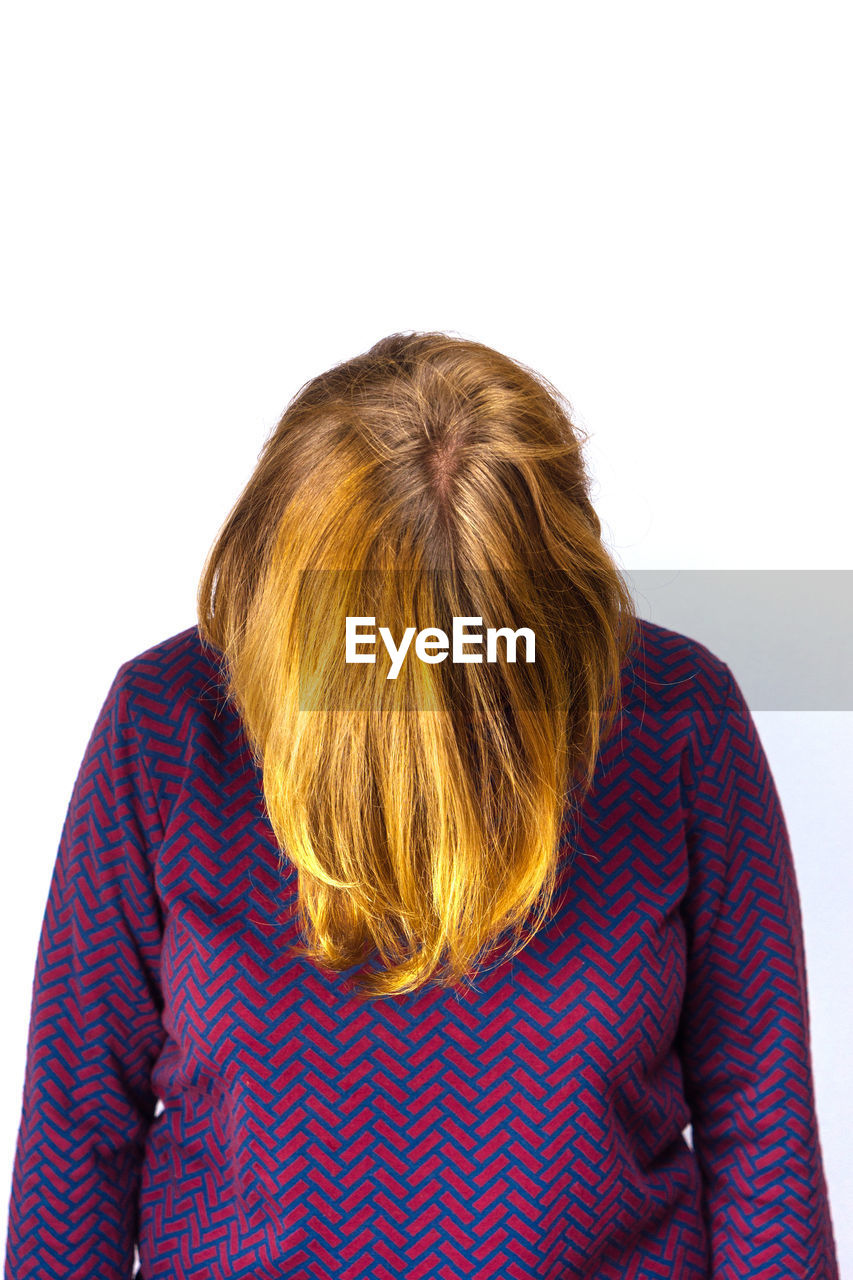 Woman against white background