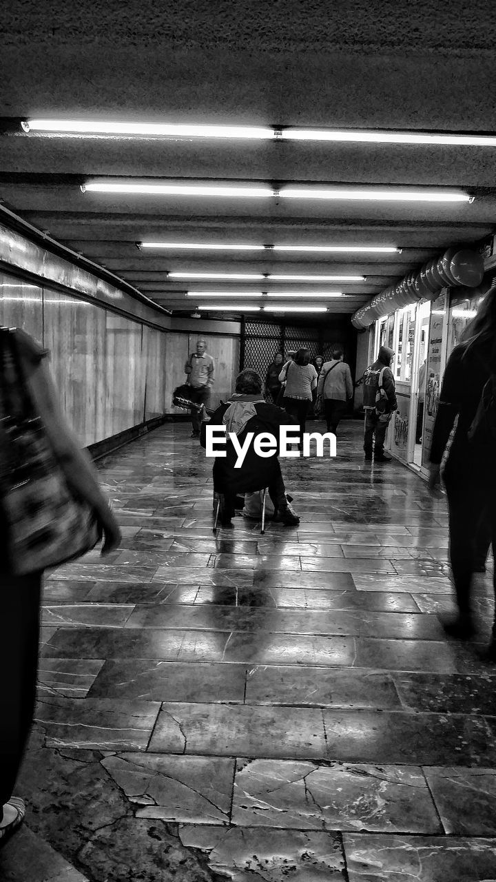 PEOPLE WALKING IN SUBWAY